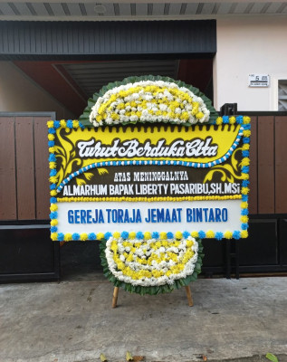 Papan Bunga Duka di Buanajaya