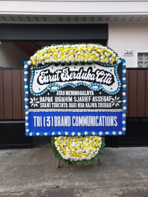 Papan Bunga Duka di Buanajaya